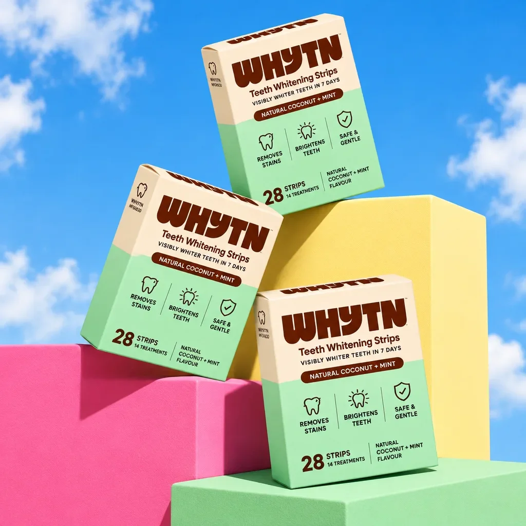 Three WHYTN boxes stacked on colorful blocks