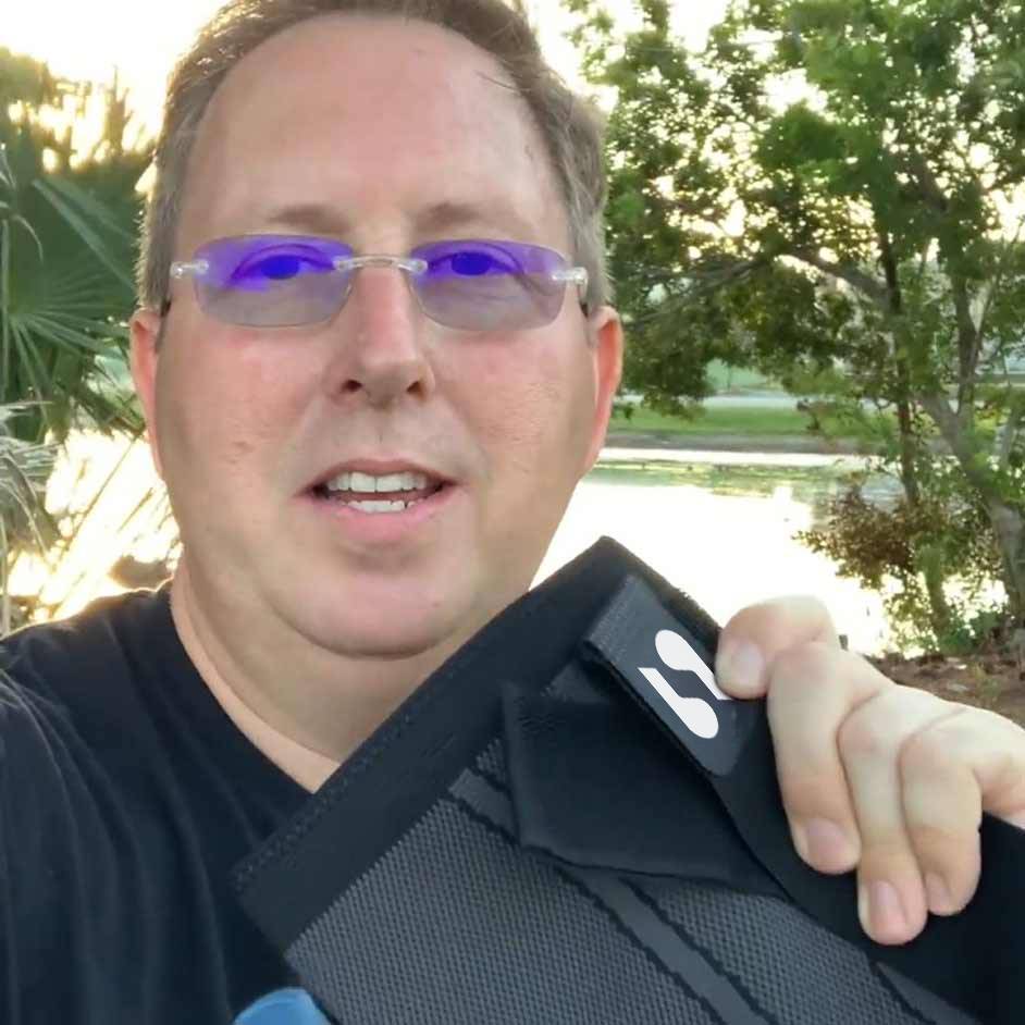 Ethan R. holding his Stedix Knee Sleeve