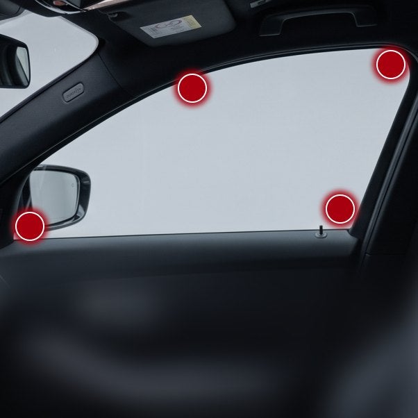 Pressing the tip into the corner of a side window