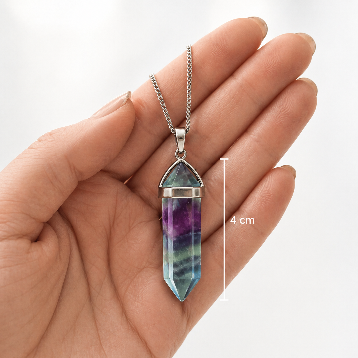 Fluorite necklace shown in hand for size