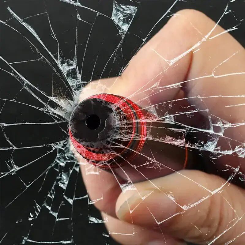 SafePro X glass breaker in use on a car window