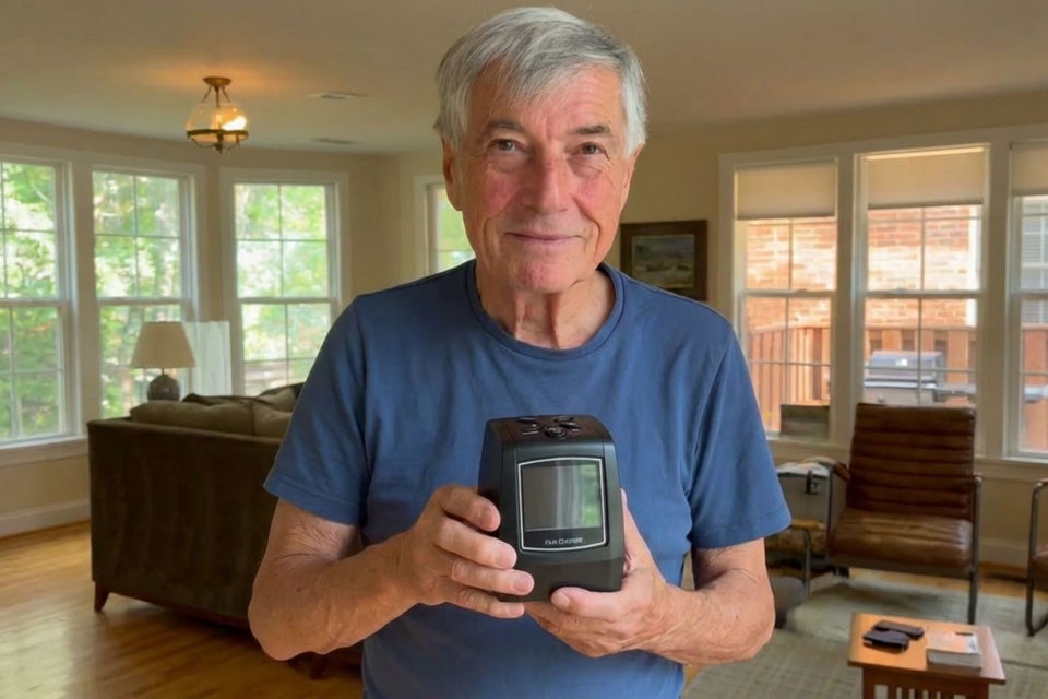 James holding his film scanner